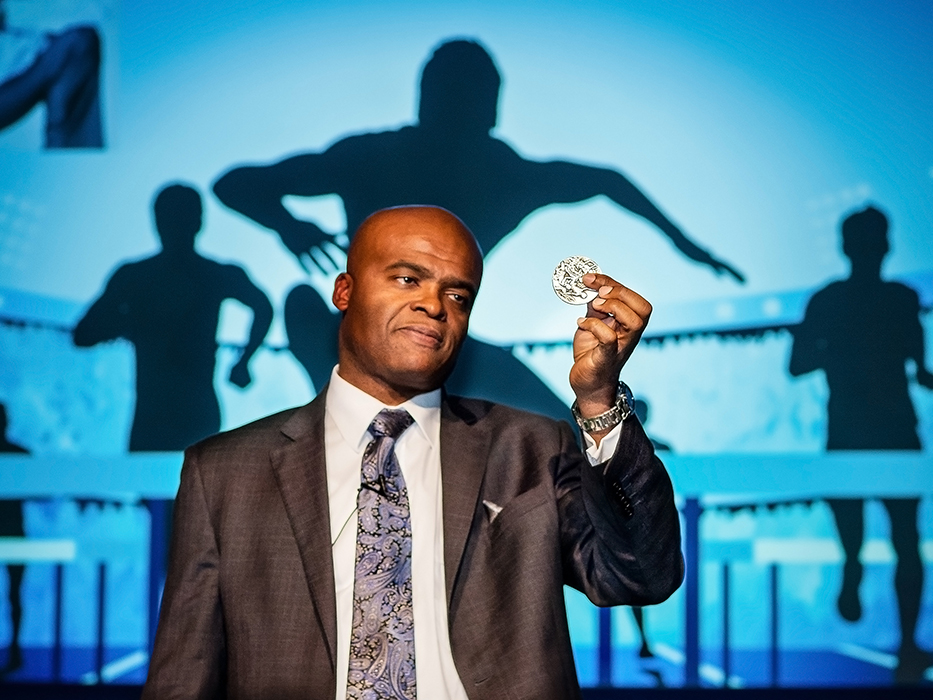 Kriss Akabusi MBE with Olympic Gold Medal